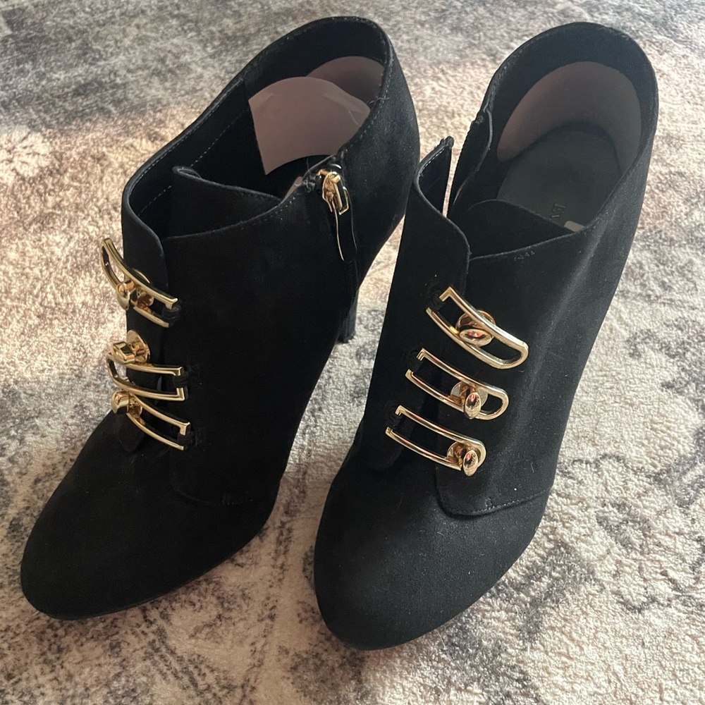 Black suede pumps